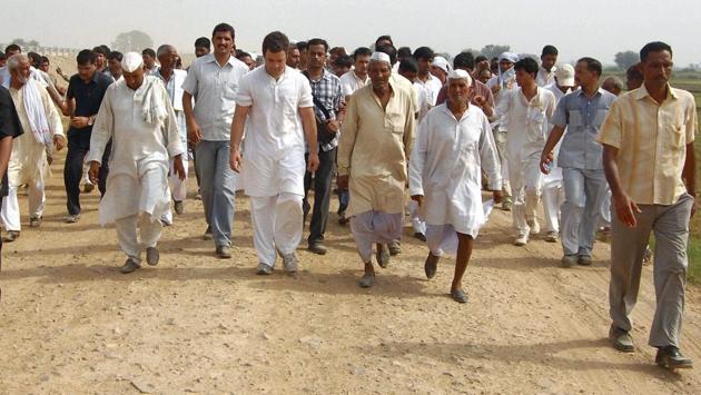 Congress General Secretary Rahul Gandhi during his 2011 protest march against the Mayawati government from Bhatta Parsual to Aligarh. In 2011, Rahul made national headlines when he took on the Mayawati government during the anti-land acquisition protests by farmers in Bhatta Parsaul. Gandhi dodged the police to enter the village, riding pillion on a farmer’s motorbike, and was arrested by the administration. (PTI) Congress General Secretary Rahul Gandhi during his 2011 protest march against the Mayawati government from Bhatta Parsual to Aligarh. In 2011, Rahul made national headlines when he took on the Mayawati government during the anti-land acquisition protests by farmers in Bhatta Parsaul. Gandhi dodged the police to enter the village, riding pillion on a farmer’s motorbike, and was arrested by the administration. (PTI)