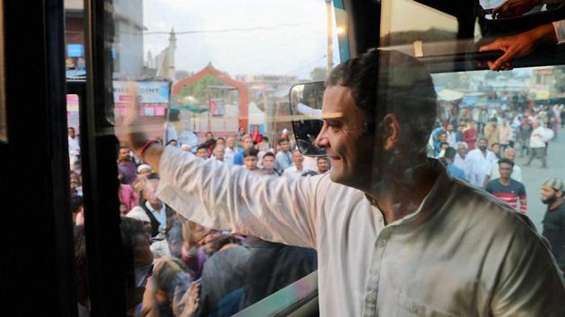 Congress vice-president Rahul Gandhi waves to supporters in Kheda district, Gujarat, on Friday while campaigning for the state assembly polls on Saturday. (PTI Photo) Congress vice-president Rahul Gandhi waves to supporters in Kheda district, Gujarat, on Friday while campaigning for the state assembly polls on Saturday. (PTI Photo)
