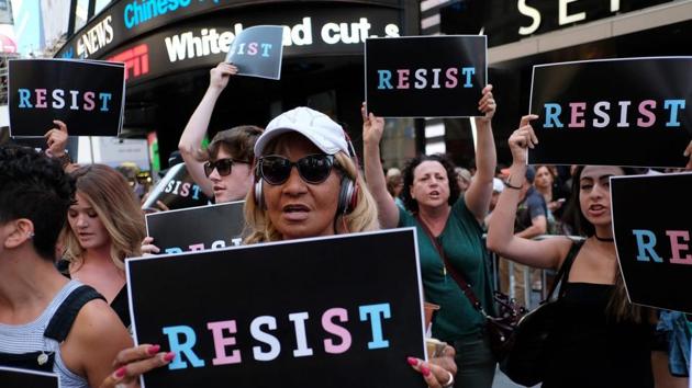 Protesters shout slogans against Donald Trump during a demonstration in front of the US Army career centre in Times Square, New York, on July 26, 2017. (AFP File) Protesters shout slogans against Donald Trump during a demonstration in front of the US Army career centre in Times Square, New York, on July 26, 2017. (AFP File)