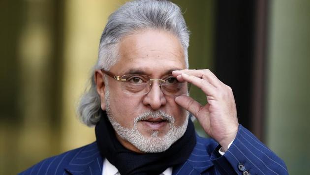 F1 Force India team boss Vijay Mallya leaves Westminster Magistrates Court during the lunch break, in London on Tuesday.(AP)
