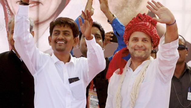 Congress president-elect Rahul Gandhi with the OBC leader Alpesh Thakor, who has joined the party, at a public meeting in Gandhinagar, Gujarat on Monday.(PTI) Congress president-elect Rahul Gandhi with the OBC leader Alpesh Thakor, who has joined the party, at a public meeting in Gandhinagar, Gujarat on Monday.(PTI)