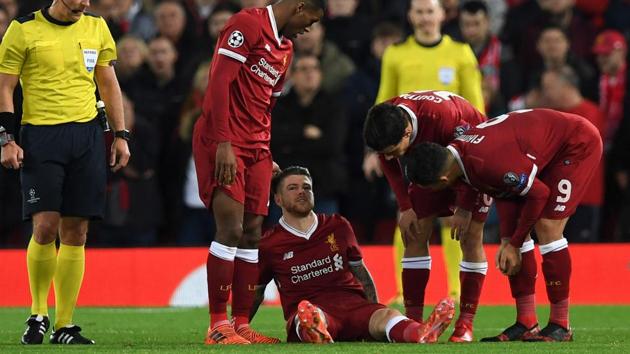 Liverpool FC's Spanish defender Alberto Moreno (centre) sits injured on the pitch during their UEFA Champions League Group E football match against Spartak Moscow at Anfield on December 6 (AFP) Liverpool FC's Spanish defender Alberto Moreno (centre) sits injured on the pitch during their UEFA Champions League Group E football match against Spartak Moscow at Anfield on December 6 (AFP)