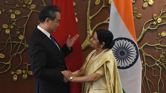 China's foreign minister Wang Yi shakes hands with his Indian counterpart Sushma Swaraj in New Delhi on December 11, 2017.(AFP Photo) China's foreign minister Wang Yi shakes hands with his Indian counterpart Sushma Swaraj in New Delhi on December 11, 2017.(AFP Photo)