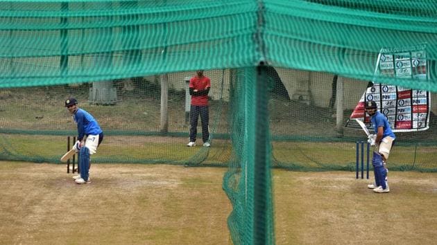 Indian cricket team stand-in captain Rohit Sharma and MS Dhoni (left) bat at the nets in Mohali on Tuesday. (PTI) Indian cricket team stand-in captain Rohit Sharma and MS Dhoni (left) bat at the nets in Mohali on Tuesday. (PTI)