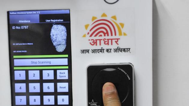 Employees mark their attendance through Aadhaar based system at Yojana Bhawan building on July 24, 2013. (HT File Photo) Employees mark their attendance through Aadhaar based system at Yojana Bhawan building on July 24, 2013. (HT File Photo)
