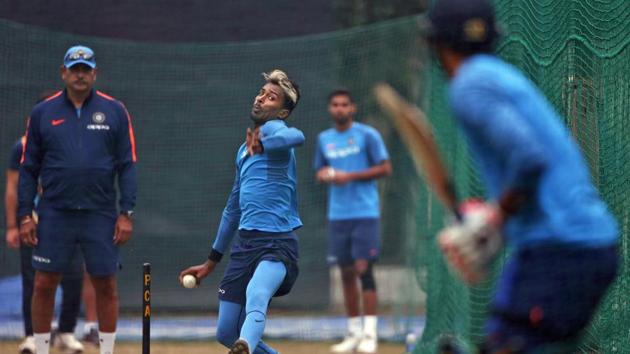 Indian cricket team head coach Ravi Shastri (left) keeps a close watch as Hardik Pandya bowls in the nets on Tuesday. (AP) Indian cricket team head coach Ravi Shastri (left) keeps a close watch as Hardik Pandya bowls in the nets on Tuesday. (AP)