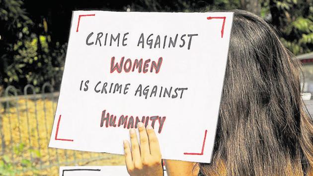School students holding placards during a protest to demand strict action against the criminals who are involved in harassments and crimes against women, in Noida. (HT File Photo) School students holding placards during a protest to demand strict action against the criminals who are involved in harassments and crimes against women, in Noida. (HT File Photo)