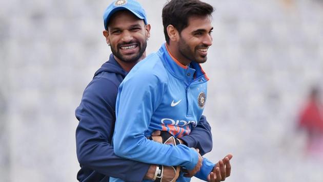 Indian cricket team's Shikhar Dhawan and Bhuvneshwar Kumar share a light moment during a practice session on the eve of the second ODI against Sri Lanka cricket team in Mohali. (PTI) Indian cricket team's Shikhar Dhawan and Bhuvneshwar Kumar share a light moment during a practice session on the eve of the second ODI against Sri Lanka cricket team in Mohali. (PTI)