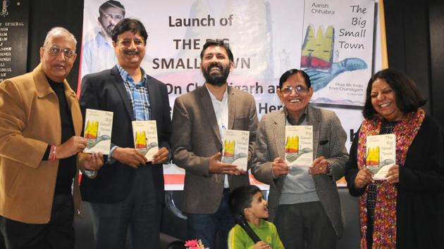 (From left) Harish Jain of Unistar Books; HT senior resident editor Ramesh Vinayak; the author Aarish Chhabra, his father Raj Kumar Chhabra; and eminent author-critic Nirupama Dutt at the launch of ‘The Big Small Town’ at Chandigarh Press Club on Tuesday.(Anil Dayal/HT) (From left) Harish Jain of Unistar Books; HT senior resident editor Ramesh Vinayak; the author Aarish Chhabra, his father Raj Kumar Chhabra; and eminent author-critic Nirupama Dutt at the launch of ‘The Big Small Town’ at Chandigarh Press Club on Tuesday.(Anil Dayal/HT)