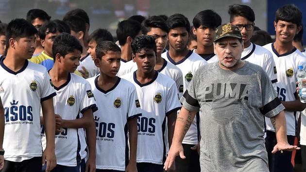 Young footballers listen to Maradona with rapt attention. (PTI)