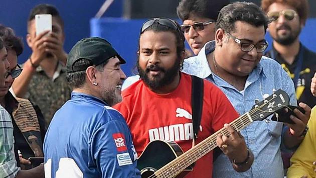 Maradona sings a song during a football workshop at Barasat in North 24 Parganas on Tuesday. (PTI)