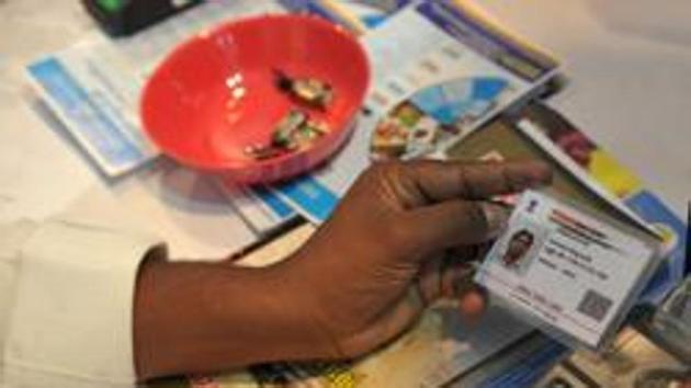 Some petitioners in the Supreme Court have termed the linking of the Unique Identification Authority of India (UIDAI) number with bank accounts and mobile numbers as “illegal and unconstitutional”. (AFP Photo) Some petitioners in the Supreme Court have termed the linking of the Unique Identification Authority of India (UIDAI) number with bank accounts and mobile numbers as “illegal and unconstitutional”. (AFP Photo)