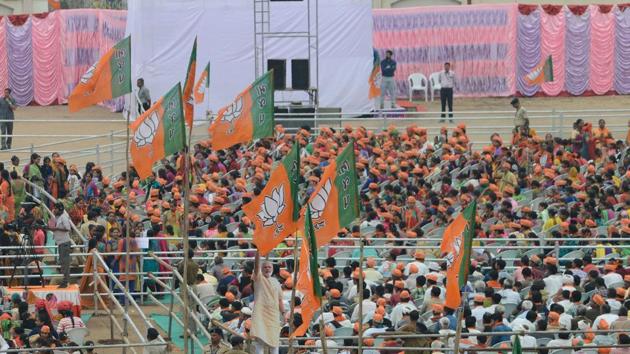 Bharatiya Janata Party flags seen around the BJP supporters participating in a rally addressed by Prime Minister Narendra Modi (Not Pictured) at Surendranagar, some 130 km from Ahmedabad. (AFP Photo) Bharatiya Janata Party flags seen around the BJP supporters participating in a rally addressed by Prime Minister Narendra Modi (Not Pictured) at Surendranagar, some 130 km from Ahmedabad. (AFP Photo)