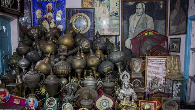 Photographs and trophies from kushti wins are seen inside the office at the Hanuman Akhada. Jai Prakash, from the Wrestling Association is similarly upbeat about the future of the sport. He says wrestling authorities want to make kushti a part of some international wrestling competitions, something he hopes might begin next year. (Dar Yasin / AP) Photographs and trophies from kushti wins are seen inside the office at the Hanuman Akhada. Jai Prakash, from the Wrestling Association is similarly upbeat about the future of the sport. He says wrestling authorities want to make kushti a part of some international wrestling competitions, something he hopes might begin next year. (Dar Yasin / AP)