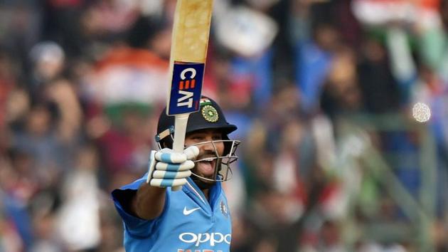 Indian cricket team’s stand-in skipper Rohit Sharma celebrates his double-century during the second ODI against Sri Lanka cricket team in Mohali on Wednesday.(PTI)