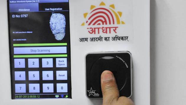Employees mark their attendance through an Aadhaar-based system in the Planning Commission. (Vipin Kumar/HT File Photo) Employees mark their attendance through an Aadhaar-based system in the Planning Commission. (Vipin Kumar/HT File Photo)