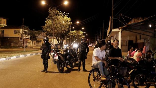 Police officers patrol a street in the working-class neighbourhood of Caimbe. Some migrants are finding ways to get by, finding accommodation or lodging in government shelters but others wander homeless, some turning to crime, adding law enforcement to existing challenges. “We have a very serious problem that will only get worse.” said Boa Vista Mayor Teresa Surita, adding that the city’s once quiet streets are increasingly filled with poor Venezuelans. (Nacho Doce / REUTERS) Police officers patrol a street in the working-class neighbourhood of Caimbe. Some migrants are finding ways to get by, finding accommodation or lodging in government shelters but others wander homeless, some turning to crime, adding law enforcement to existing challenges. “We have a very serious problem that will only get worse.” said Boa Vista Mayor Teresa Surita, adding that the city’s once quiet streets are increasingly filled with poor Venezuelans. (Nacho Doce / REUTERS)