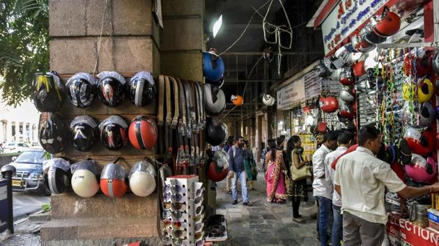Hawkers near CST use nails to hang their goods, damaging heritage walls. (Kunal Patil/HT PHOTO) Hawkers near CST use nails to hang their goods, damaging heritage walls. (Kunal Patil/HT PHOTO)
