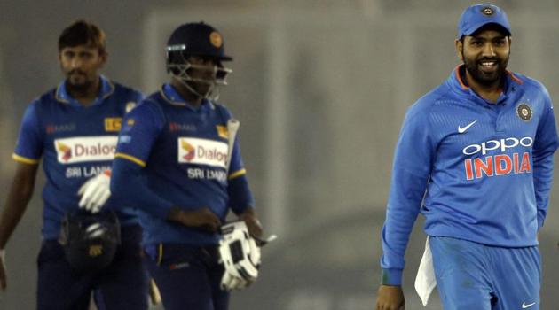 Indian cricket team captain Rohit Sharma (right) leaves the ground after the win over Sri Lanka cricket team in the second ODI in Mohali. (AP) Indian cricket team captain Rohit Sharma (right) leaves the ground after the win over Sri Lanka cricket team in the second ODI in Mohali. (AP)
