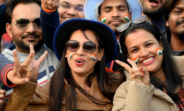 Cricket fans with their faces painted were seen cheering for the Indian team at PCA Stadium in Mohali. (AFP)