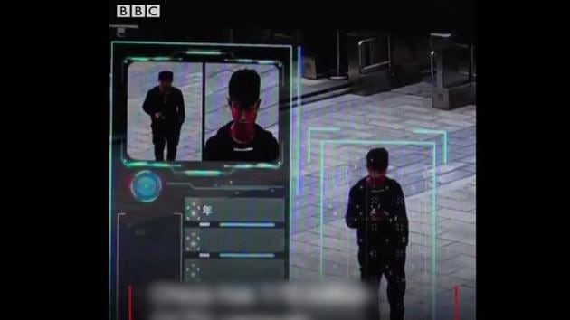 Chinese officials say the CCTV cameras are capable of linking faces to ID cards and can also estimate age, ethnicity, and gender of a person(Twitter/ Screengrab(BBC))