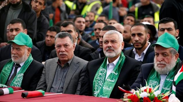Hamas Chief Ismail Haniyeh (2nd R) attends a rally marking the 30th anniversary of Hamas' founding, in Gaza City December 14, 2017.(REUTERS Photo)