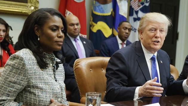 File photo shows Omarosa Manigault Newman with President Donald Trump during a meeting on African American History Month in the White House in Washington.(AP)