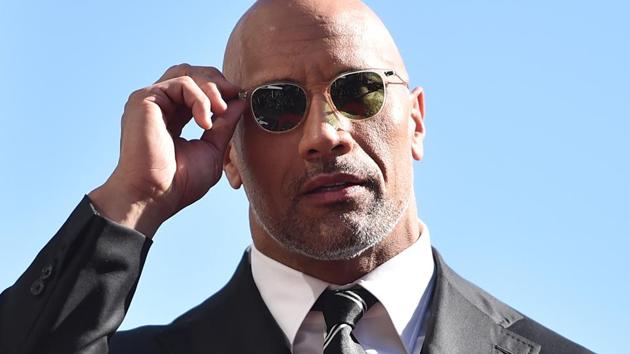 Actor Dwayne Johnson attends a ceremony honouring him with the 2,624th star on the Hollywood Walk of Fame. (AFP) Actor Dwayne Johnson attends a ceremony honouring him with the 2,624th star on the Hollywood Walk of Fame. (AFP)