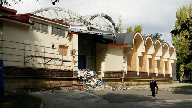 A child walks past a damaged building in the Oktyabrsky district of Donetsk. The self-styled Donetsk and next-door Luhansk “people’s republics” broke away from central rule in 2014 after months of violent street protests in Kiev. Fierce clashes followed in the calm suburbs of Donetsk between Ukrainian government troops and pro-Russia separatists for control over the nearby Donetsk airport. (Alexander Ermochenko / REUTERS) A child walks past a damaged building in the Oktyabrsky district of Donetsk. The self-styled Donetsk and next-door Luhansk “people’s republics” broke away from central rule in 2014 after months of violent street protests in Kiev. Fierce clashes followed in the calm suburbs of Donetsk between Ukrainian government troops and pro-Russia separatists for control over the nearby Donetsk airport. (Alexander Ermochenko / REUTERS)