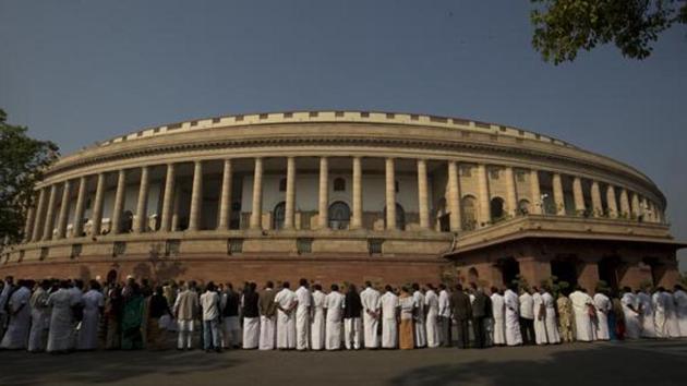 Indian lawmakers from opposition parties form a human chain outside the parliament building during a protest against the government demonetizing high-value bills in New Delhi, India, Wednesday, Nov. 23, 2016. (AP File Photo) Indian lawmakers from opposition parties form a human chain outside the parliament building during a protest against the government demonetizing high-value bills in New Delhi, India, Wednesday, Nov. 23, 2016. (AP File Photo)