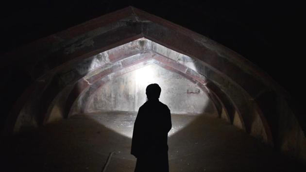A caretaker points to rubble within the mosque. “The study would also be required to ascertain the intricate damage to the walls, domes and the structure since it is not a modern structure. The special plasters used by the engineers of Shahjahan have to be protected. For this, the immediate need is to arrest the seepage of water and then a comprehensive restoration could be started,” Tariq said. (Sanchit Khanna / HT Photo)