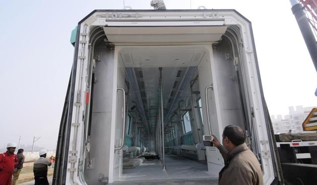 The four coaches reached Greater Noida on Thursday morning from Nanjing, China. Each coach costs around Rs11 crore. The coaches were brought from the Mundra port of Gujarat by road, officials said.(Sunil Ghosh/HT Photo) The four coaches reached Greater Noida on Thursday morning from Nanjing, China. Each coach costs around Rs11 crore. The coaches were brought from the Mundra port of Gujarat by road, officials said.(Sunil Ghosh/HT Photo)