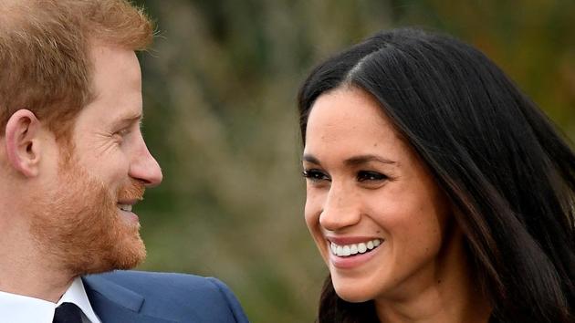 Britain's Prince Harry poses with Meghan Markle in the Sunken Garden of Kensington Palace in London on November 27, 2017. (Reuters File Photo) Britain's Prince Harry poses with Meghan Markle in the Sunken Garden of Kensington Palace in London on November 27, 2017. (Reuters File Photo)