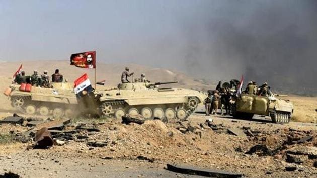 Members of Iraqi Army are seen during the war between Iraqi army and Shia Popular Mobilization Forces (PMF) against the Islamic State militants in al-'Ayadiya, northwest of Tal Afar, Iraq August 28, 2017.(REUTERS File Photo)