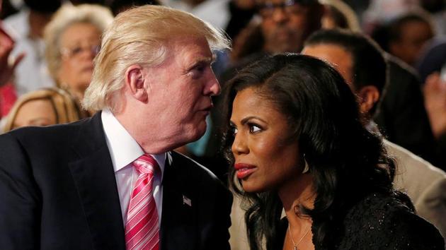 Then Republican presidential nominee Donald Trump and Omarosa Manigault (R) attend a church service, in Detroit, Michigan, US, September 3. 2016. (Reuters File Photo) Then Republican presidential nominee Donald Trump and Omarosa Manigault (R) attend a church service, in Detroit, Michigan, US, September 3. 2016. (Reuters File Photo)