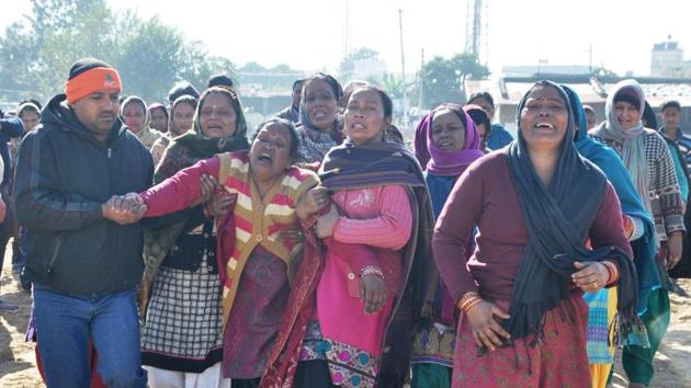 Relatives of one of the deceased in tears, in Dehradun on Friday. (Vinay Santosh Kumar/HT Photo) Relatives of one of the deceased in tears, in Dehradun on Friday. (Vinay Santosh Kumar/HT Photo)