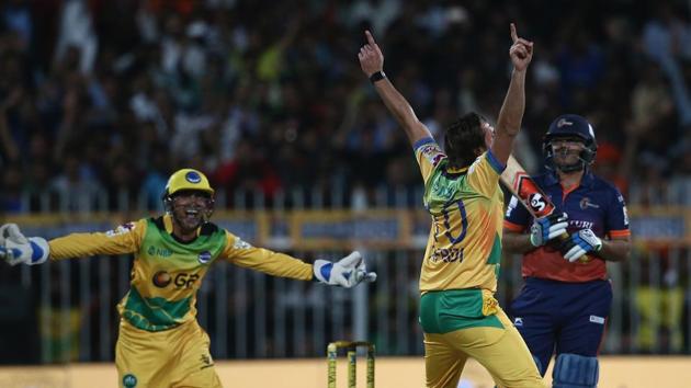 Shahid Afridi of Pakhtoons celebrates with teammates after taking a hat-trick during the T10 League match against Maratha Arabians at Sharjah Cricket Stadium on December 14. (Getty Images) Shahid Afridi of Pakhtoons celebrates with teammates after taking a hat-trick during the T10 League match against Maratha Arabians at Sharjah Cricket Stadium on December 14. (Getty Images)