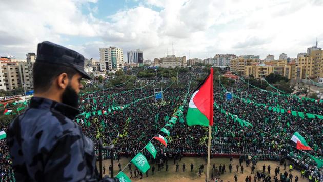 Hamas supporters take part in a rally marking the 30th anniversary of the founding of the Islamist movement, in Gaza City, on December 14, 2017. (Mohammed Abed / AFP) Hamas supporters take part in a rally marking the 30th anniversary of the founding of the Islamist movement, in Gaza City, on December 14, 2017. (Mohammed Abed / AFP)