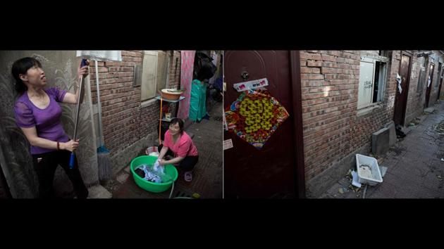 However not everyone has left, and a handful of holdouts are preparing for tough times. With no electricity or heating and a harsh winter ahead, Wang Liping, one of the migrant says she would rather freeze to death than abandon her home. (Nicolas Asfouri / AFP)