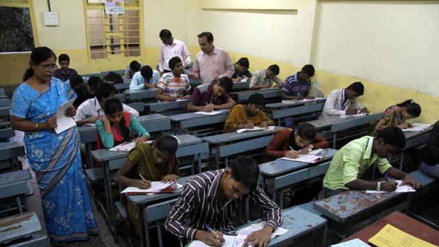 Students appear for an exam. A student received an honours in psychology, a subject he never opted, exposing yet again the rot that has set in Bihar’s education system.(HT File Photo)