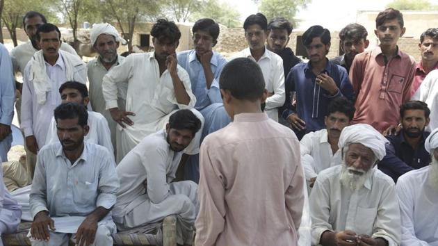 A Pakistani boy who said he was raped by a religious cleric stands before villagers in Vehari, Pakistan. (AP File Photo) A Pakistani boy who said he was raped by a religious cleric stands before villagers in Vehari, Pakistan. (AP File Photo)