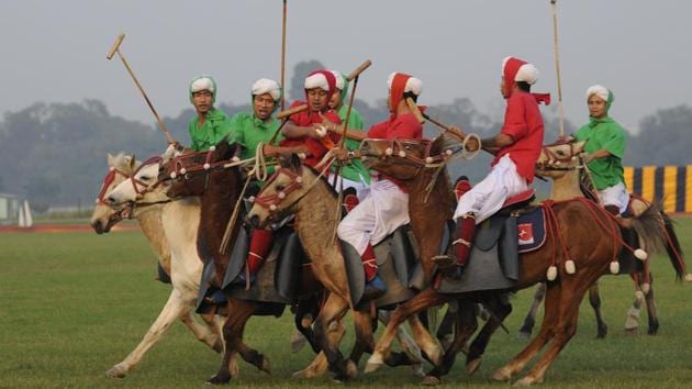 Manipuri players in traditional dress on their ponies known as Sagol Kangjei during Viijay Diwas to mark India's victory over Pakistan on 1971 at RCTC ground in Kolkata on Thursday. (Samir Jana / HT Photo) 