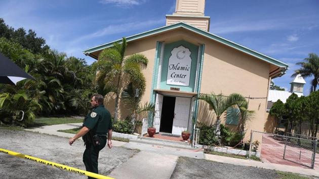 Law enforcement officials investigate a fire at the Islamic Center of Fort Pierce, which was the mosque attended by the Pulse nightclub gunman, who killed 49 people in Orlando on September 12, 2016 in Fort Pierce, Florida.(Getty Images Files) Law enforcement officials investigate a fire at the Islamic Center of Fort Pierce, which was the mosque attended by the Pulse nightclub gunman, who killed 49 people in Orlando on September 12, 2016 in Fort Pierce, Florida.(Getty Images Files)