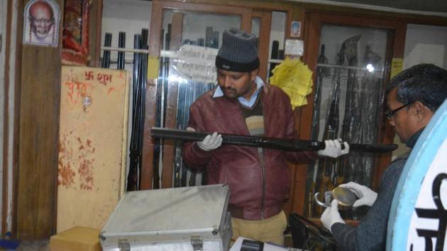 The gang stole pistols, revolvers, rifles and double-barrel guns from an Uttar Pradesh shop, which had a government contract to collect firearms from people before elections. (HT) The gang stole pistols, revolvers, rifles and double-barrel guns from an Uttar Pradesh shop, which had a government contract to collect firearms from people before elections. (HT)