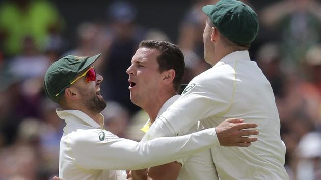 Australia's Josh Hazlewood(C) celebrates with the teammates after dismissing England's Alastair Cook during the fourth day of their Ashes Test match in Perth. (AP) Australia's Josh Hazlewood(C) celebrates with the teammates after dismissing England's Alastair Cook during the fourth day of their Ashes Test match in Perth. (AP)