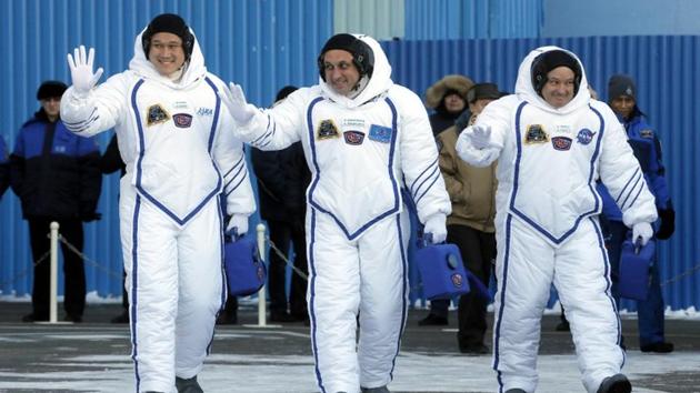 Members of the International Space Station expedition 54/55, Roscosmos cosmonaut Anton Shkaplerov (C), NASA astronaut Scott Tingle (R) and Norishige Kanai of the Japan Aerospace Exploration Agency during the send-off ceremony after checking their space suits before the launch of the Soyuz MS-07 spacecraft at the Baikonur cosmodrome, in Kazakhstan, on Sunday. (REUTERS) Members of the International Space Station expedition 54/55, Roscosmos cosmonaut Anton Shkaplerov (C), NASA astronaut Scott Tingle (R) and Norishige Kanai of the Japan Aerospace Exploration Agency during the send-off ceremony after checking their space suits before the launch of the Soyuz MS-07 spacecraft at the Baikonur cosmodrome, in Kazakhstan, on Sunday. (REUTERS)