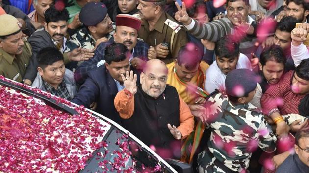 BJP president Amit Shah arrives at the party head quarters in New Delhi to address media. Amit Shah says the BJP’s vote share in the state has increased by 10% from the last time. (Sonu Mehta /  HT Photo) 