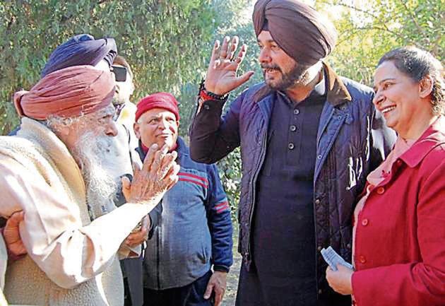 Minister Navjot Singh Sidhu and his wife, former MLA Navjot Kaur Sidhu, meet voters in Amritsar on Sunday (Sameer Sehgal/HT Photo) Minister Navjot Singh Sidhu and his wife, former MLA Navjot Kaur Sidhu, meet voters in Amritsar on Sunday (Sameer Sehgal/HT Photo)