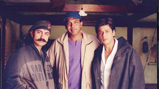 Aamir Khan and Shah Rukh Khan pose with Swades director Ashutosh Gowarikar.