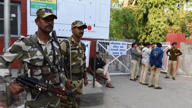 Police security outside a counting center during Gujarat Assembly Elections 2017 at Ahmedabad on December 18, 2017. The results of the Gujarat elections are seen as a litmus test for the Bharatiya Janata Party ahead of the 2019 Lok Sabha elections. (Satish Shankar Bate / HT Photo)